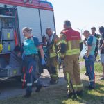 Man met scootmobiel te water aan Koning Willem-Alexander Boulevard in Maassluis